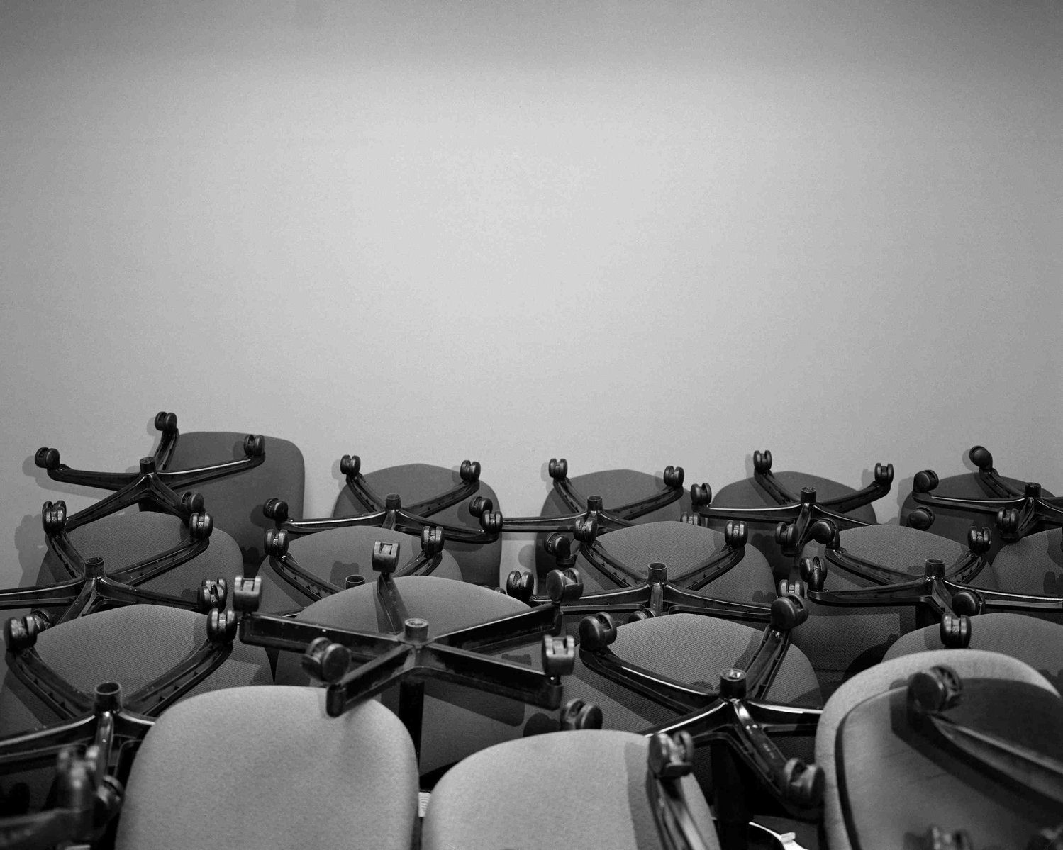 “I’m afraid that I am going to miss my chance to make my mark and stand out from the others,” Makalah, pictured in the previous photo, said. “But I hope that showing up when no one else does will go a long way.” Here, dozens of chairs are stored away belo