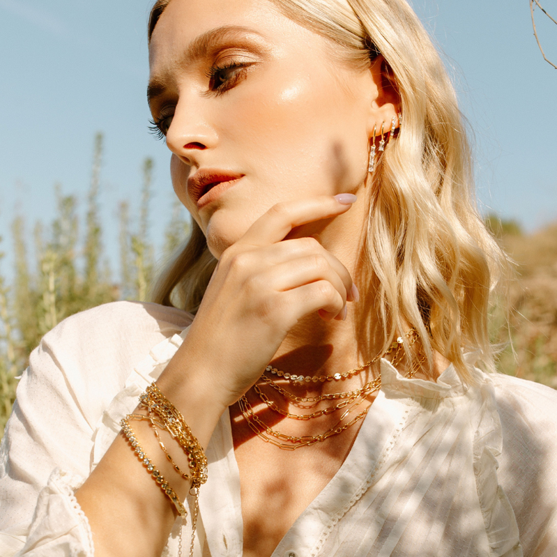 Jewelry on a girl in wildflowers