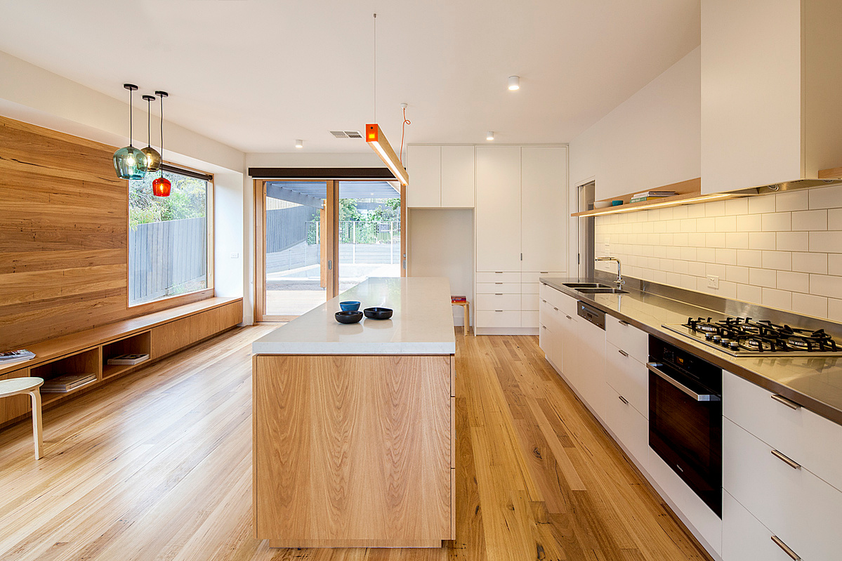 A window seat is added to the width of this existing room to ensure that the kitchen dining space are spacous