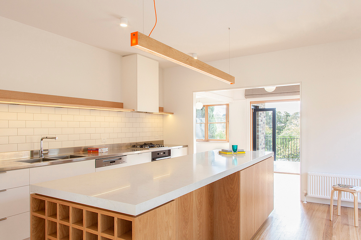 White oak veneer is used as a feature throughout this home