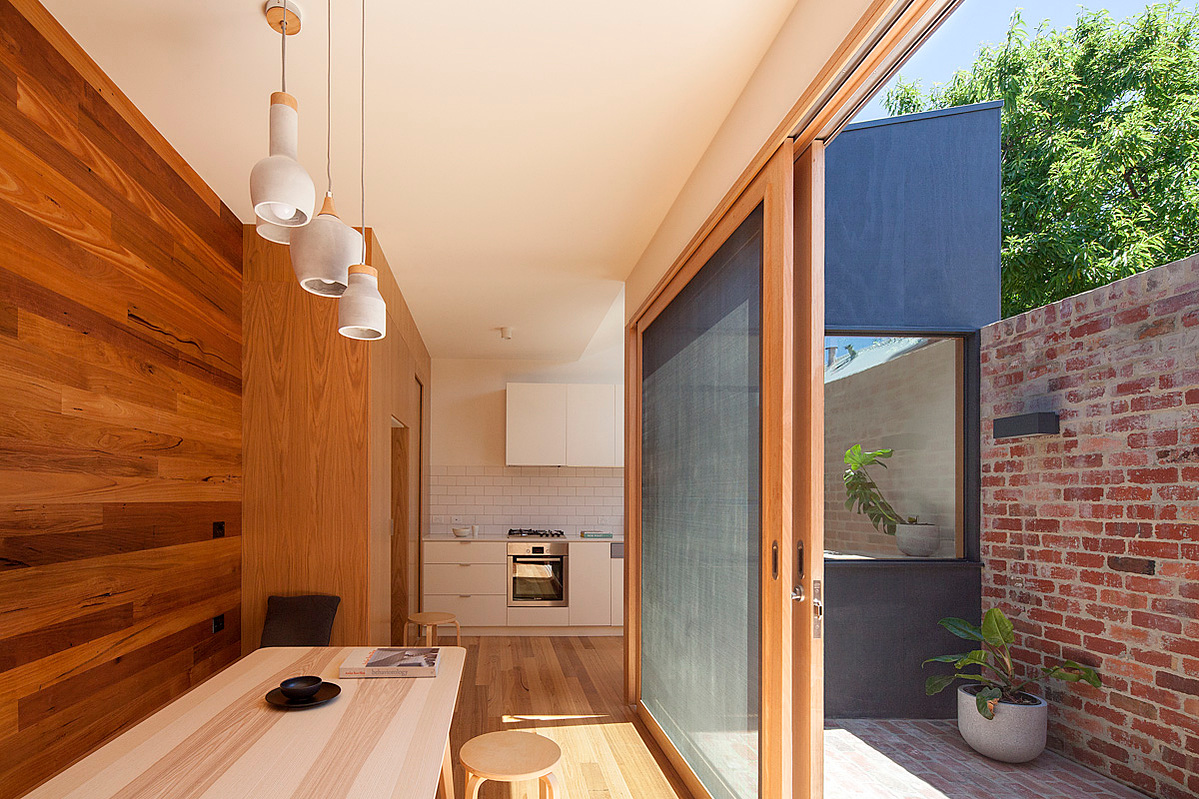 A central courtyard re-orientates the house to the north and transforms a once dark dank interior into a light filled airy and open space