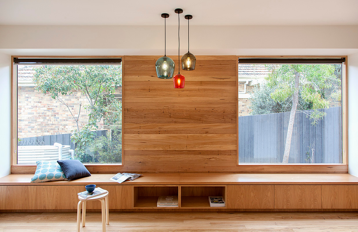 Recycled remilled messmate timber lining boards create a backdrop to the this timber window seat