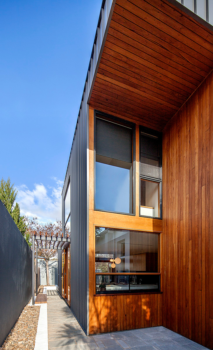 A new two storey building to the south of the existing building captures north light through highlight glazing