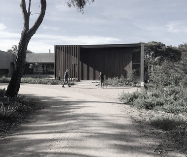 A photographer takes photos of a new contemporary sustainable house in Torquay
