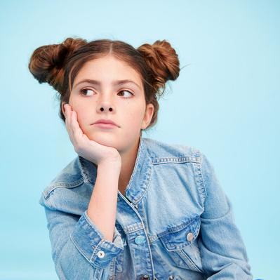 Youth model portfolio image for a preteen model signed to DirectionsUSA wearing streetwear