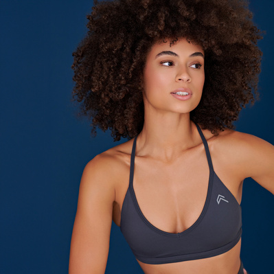 Natural hair ecommerce model wearing athleasure atire