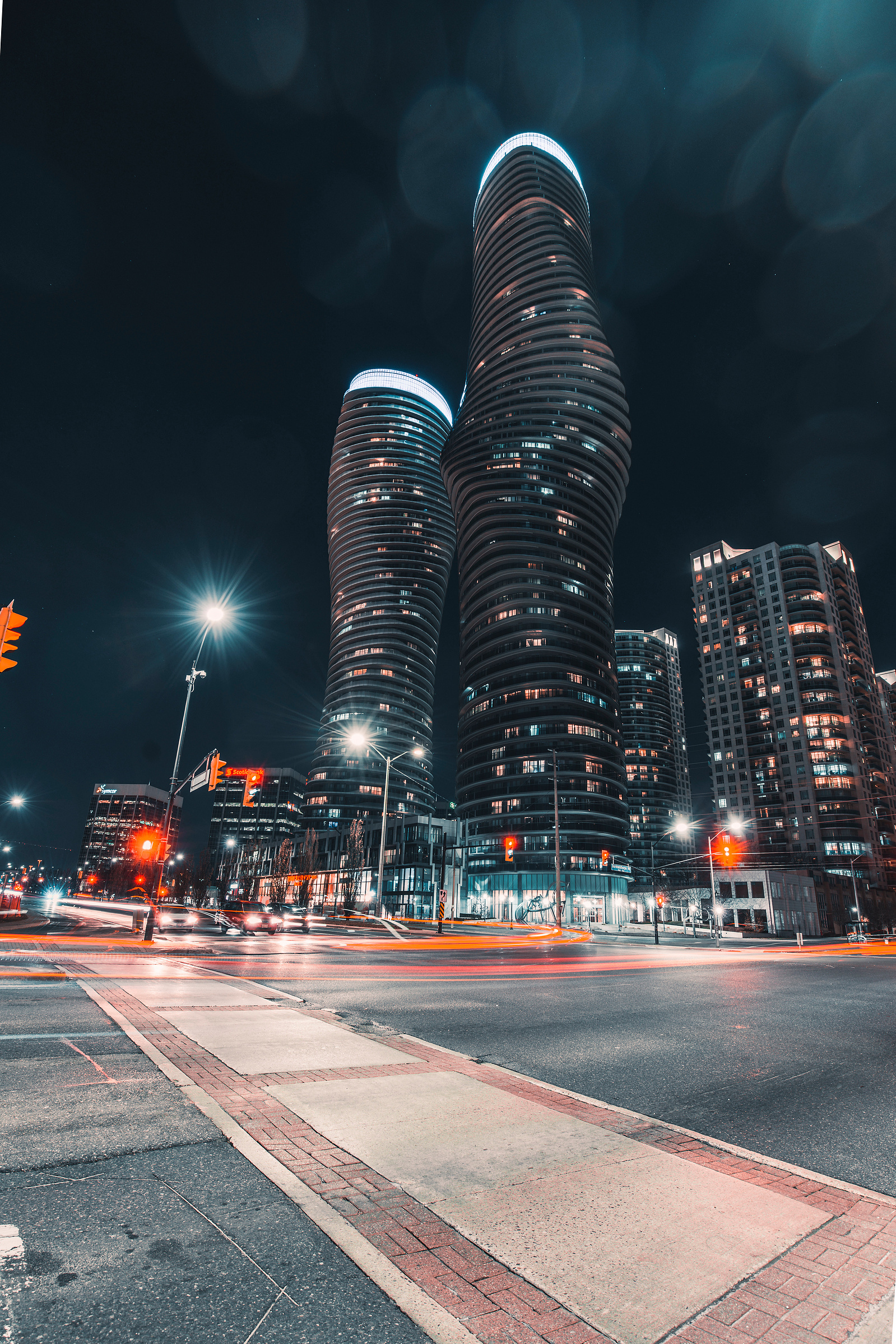 Night time view of the Marilyn Monroe/Absolute Towers in Mississauga