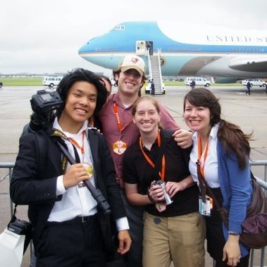 A photo of Enoch and BG News staff in 2009, while waiting for President Obama to step out of Air Force One after arriving in Cleveland, Ohio.