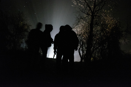Animal-Rights activists coming back from a turkey factory farm after they took back SD-cards from their hidden micro-cameras placed outside and inside the factory farm. They install hidden cameras to record abuses and violence on animals by workers.