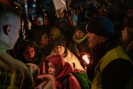 A group of women refugee with children, fleeing from Ukraine by bus. 