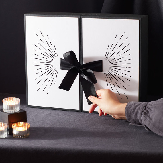 Christmas product photography, luxury advent calendar on a black background