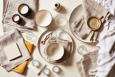 Product photography props beige ceramics and glassware