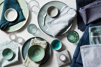 Product photography props green and blue ceramics and glassware
