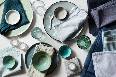 Product photography props green and blue ceramics and glassware