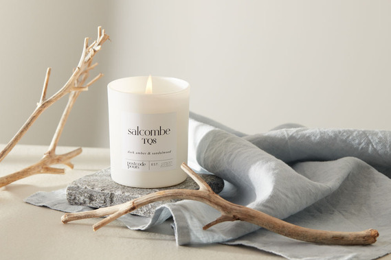  Candle product photography Coastal styling with driftwood and shells