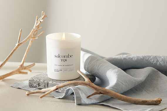  Candle product photography Coastal styling with driftwood and shells