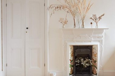 White Edwardian fireplace and mantlepiece 