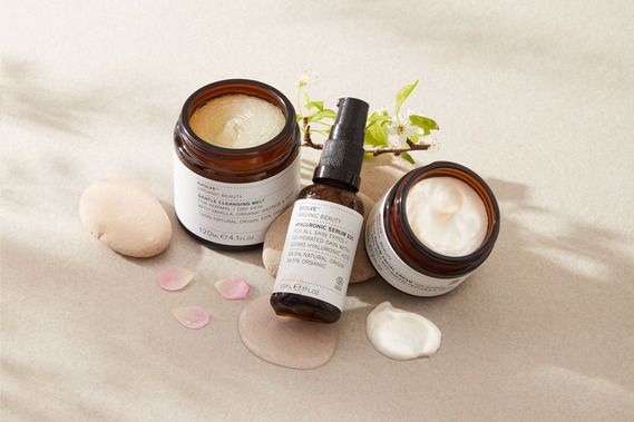 Skincare product photography Evolve Organic Beauty, group-shot of open jars with swatches 