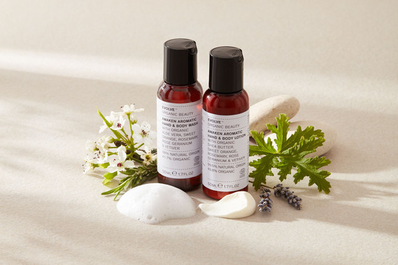 Skincare product photography Evolve Organic Beauty, travel size bottles with ingredients and swatches