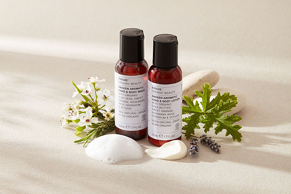 Skincare product photography Evolve Organic Beauty, travel size bottles with ingredients and swatches