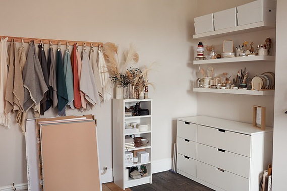 Product photography studio showing props on display