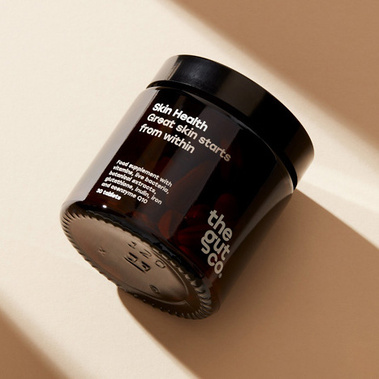 Supplements product photography, jar in a long shadow