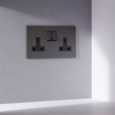 Homeware product photography of Focus SB designer light switches on a grey wall