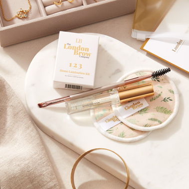 Beauty product photography, brow lamination products on a dressing table