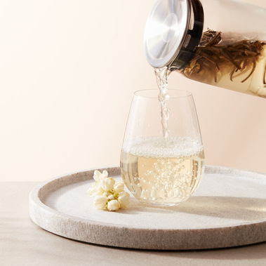 Tea product photography.  Pouring cold brew tea into a glass, food and drinks photography