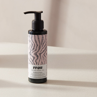 Beauty product photography.  Branding, haircare product on a neutral background with shadows
