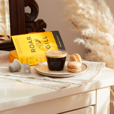 Coffee product photography.  Espresso coffee with biscuits on a marble dressing table 