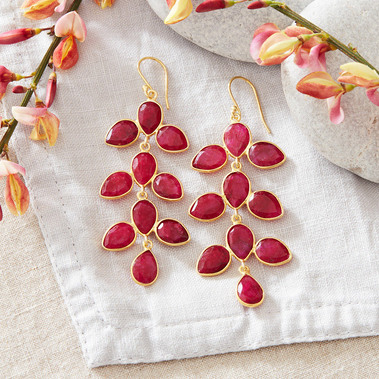 Etsy jewellery photographer UK Boho gold earrings on a linen background