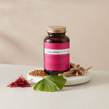 Ashwadisiac supplements for Women, a jar with the key ingredients surrounding it.