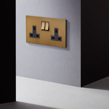Homeware product photography of Focus SB designer light switches on a grey wall