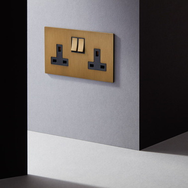 Homeware product photography of Focus SB designer light switches on a grey wall
