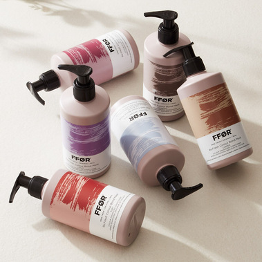Haircare product photography on a neutral background with shadows 