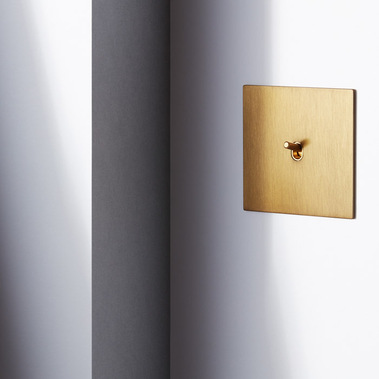 Homeware product photography of Focus SB designer light switches on a grey wall