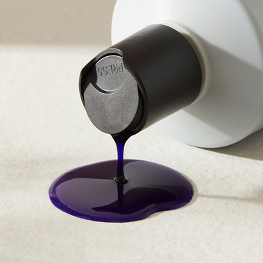 Beauty product photography swatch shampoo pouring out