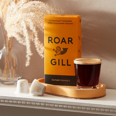 Lifestyle product photography for coffee, neutral colours and strong shadows