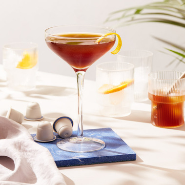 Coffee cocktail in a martini glass on a sunny day