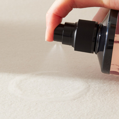 Spraying hair care product