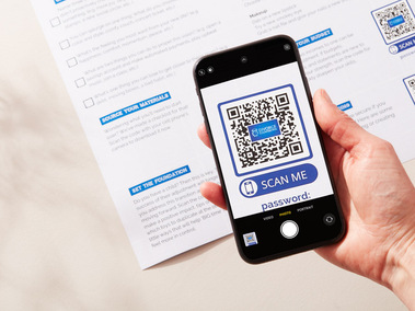 Stationary photography showing a QR code being taken with a phone