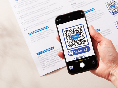 Stationary photography showing a QR code being taken with a phone