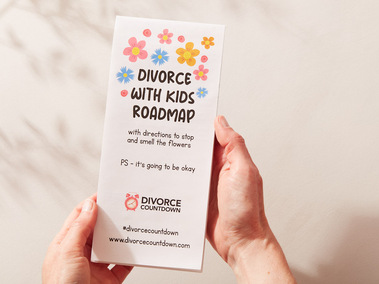 Stationary photography of a divorce guide being held in hands