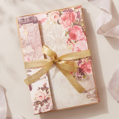 Wedding stationary photography, book with silk ribbon on a neutral background