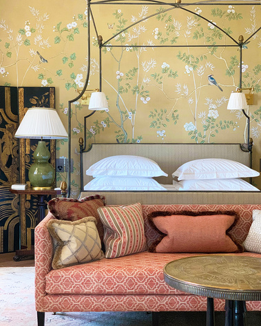 This guest bedroom of a house on Lake Como was designed by interior designer Thomas Daviet, based in London and Menorca