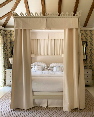 This bedroom of a house on Lake Como was designed by interior designer Thomas Daviet, based in London and Menorca