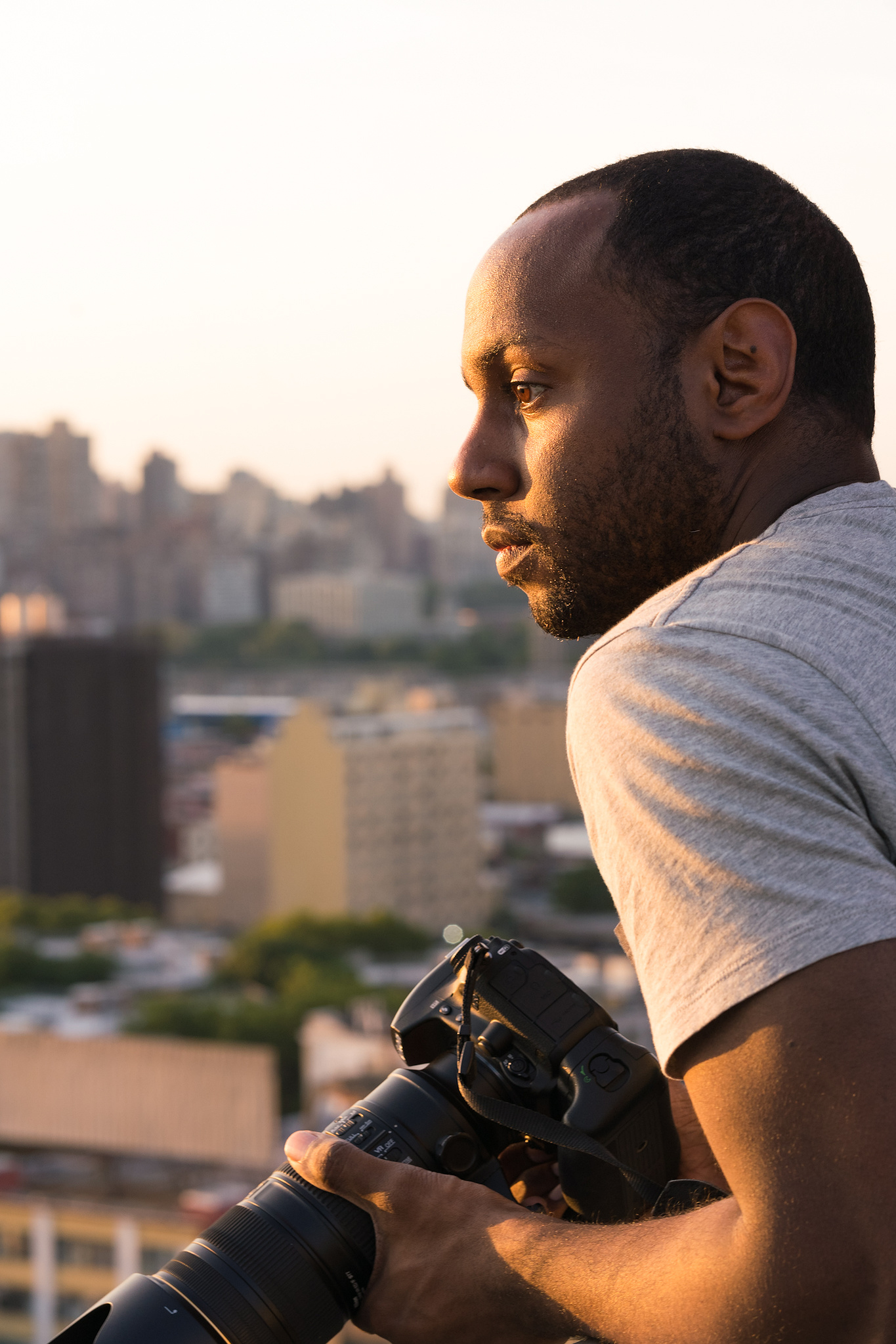 A photo of New York photographer DeShaun Craddock, taken by Jill Rittymanee.