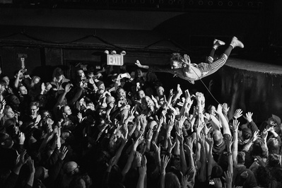 Justin Hawkins of The Darkness diving into the crowd at Irving Plaza in NYC