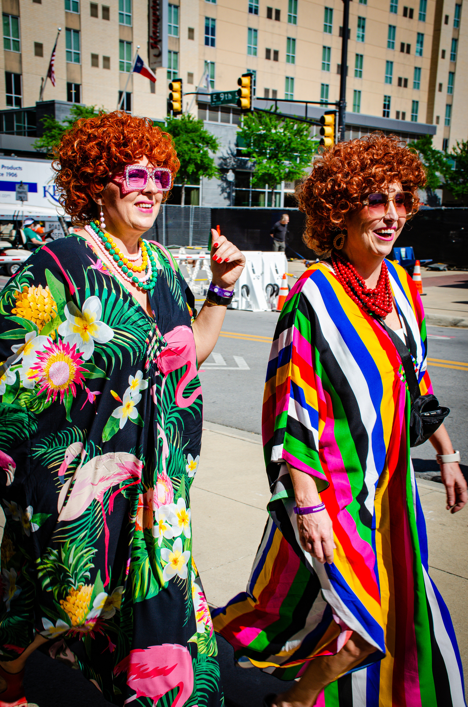 A floral riot, oversized shades, and the joy of being seen—and doubled.